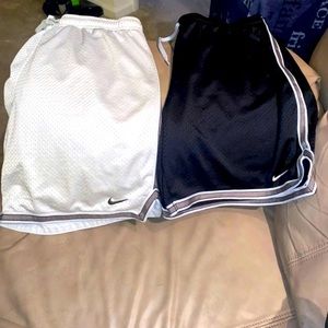 2 pairs of women’s Nike shorts size M.